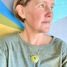 Load image into Gallery viewer, Stylized Orange Flower Tin Necklace