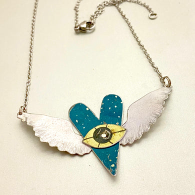 The Heart Sees Teal Tin Necklace