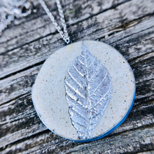 Load image into Gallery viewer, Reversible Sunray and Silver Leaf Leaf Concrete &amp; Tin Necklace